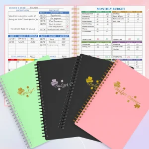 A5 Clover-Style Budget Planners in green, black, and pink, showing the durable waterproof cover, gold foil "Budget Planner" text, and sturdy spiral binding.