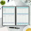 Financial Logbook on Desk with Calculator
