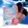 A couple kissing at night, with the Date Idea Cards product box superimposed, suggesting a romantic outcome.